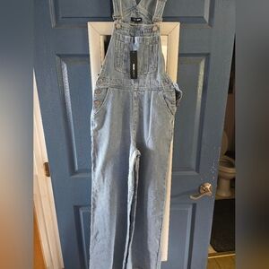 Fashion Nova Medium Wash Wide Leg Overalls. Legs Are 10 Inches Wide